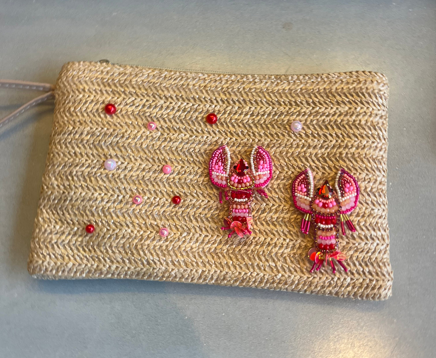 Beige beaded lobster pouch / clutch bag
