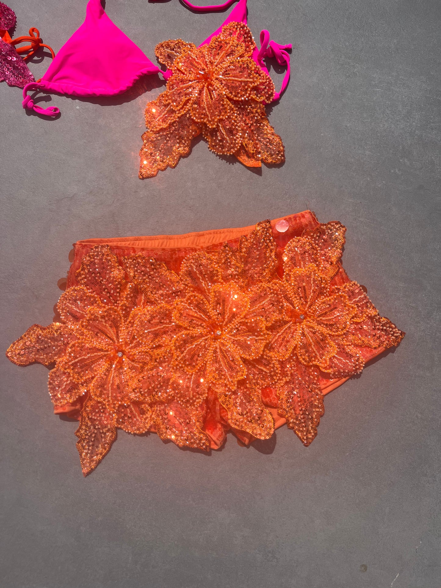 Orange Gracie sequin shorts