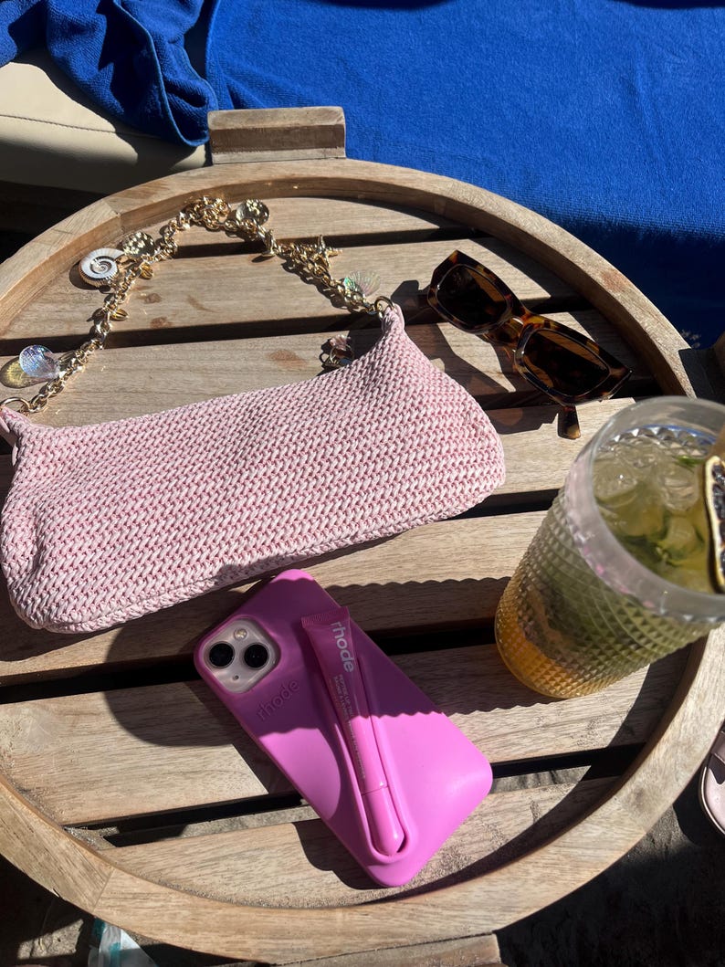 Pink shells charm bag