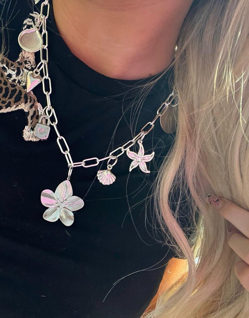 Silver flower charm necklace