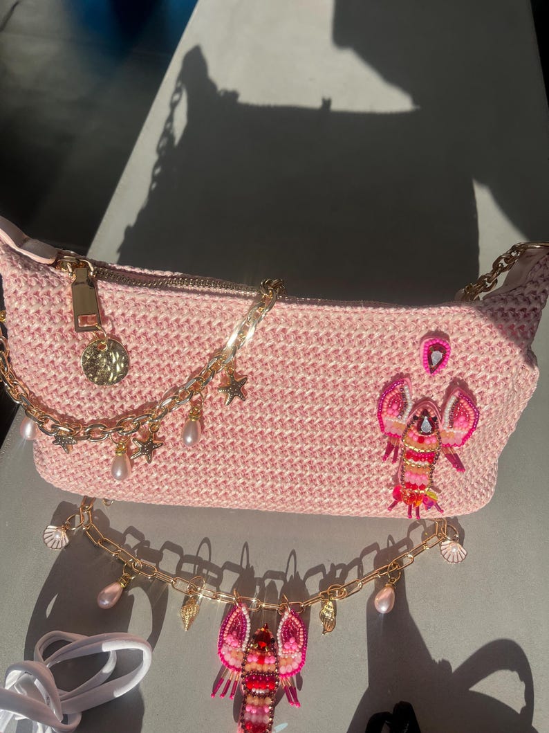 Pink lobster charm bag