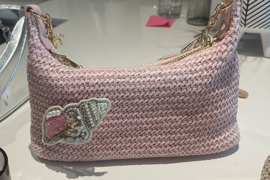 Pink beaded shell charm bag