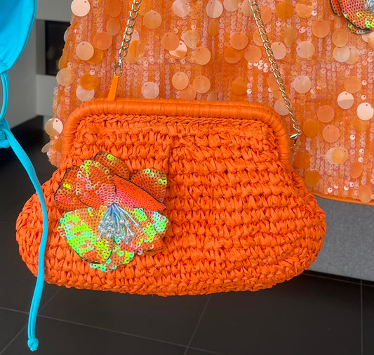 Orange flora charm bag