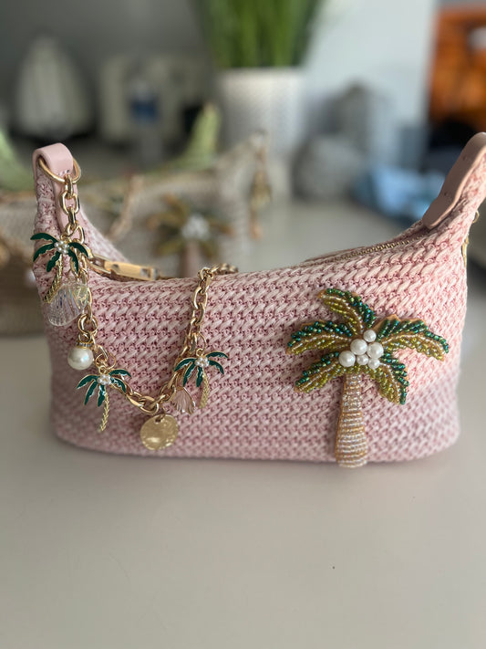 Pink beaded palm tree charm bag