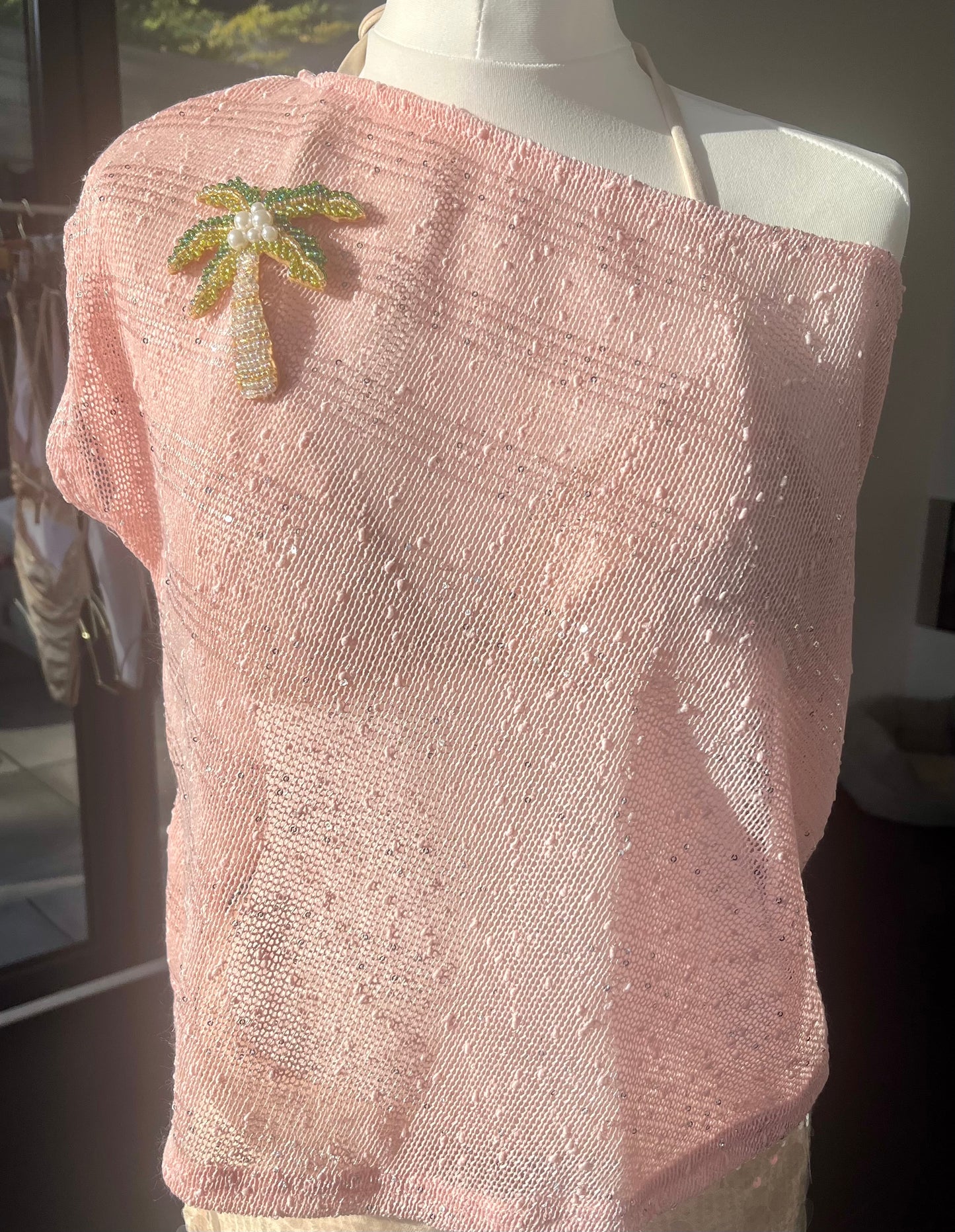 Pink beaded palm tree poncho cover up