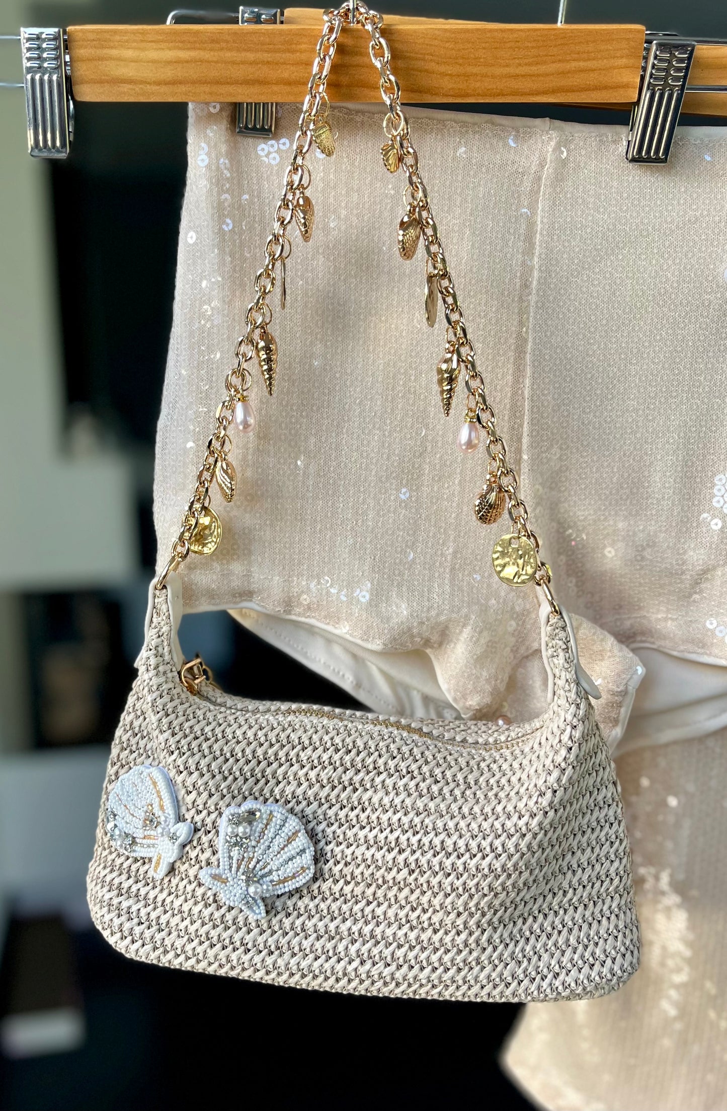 Beige beaded seashell charm bag