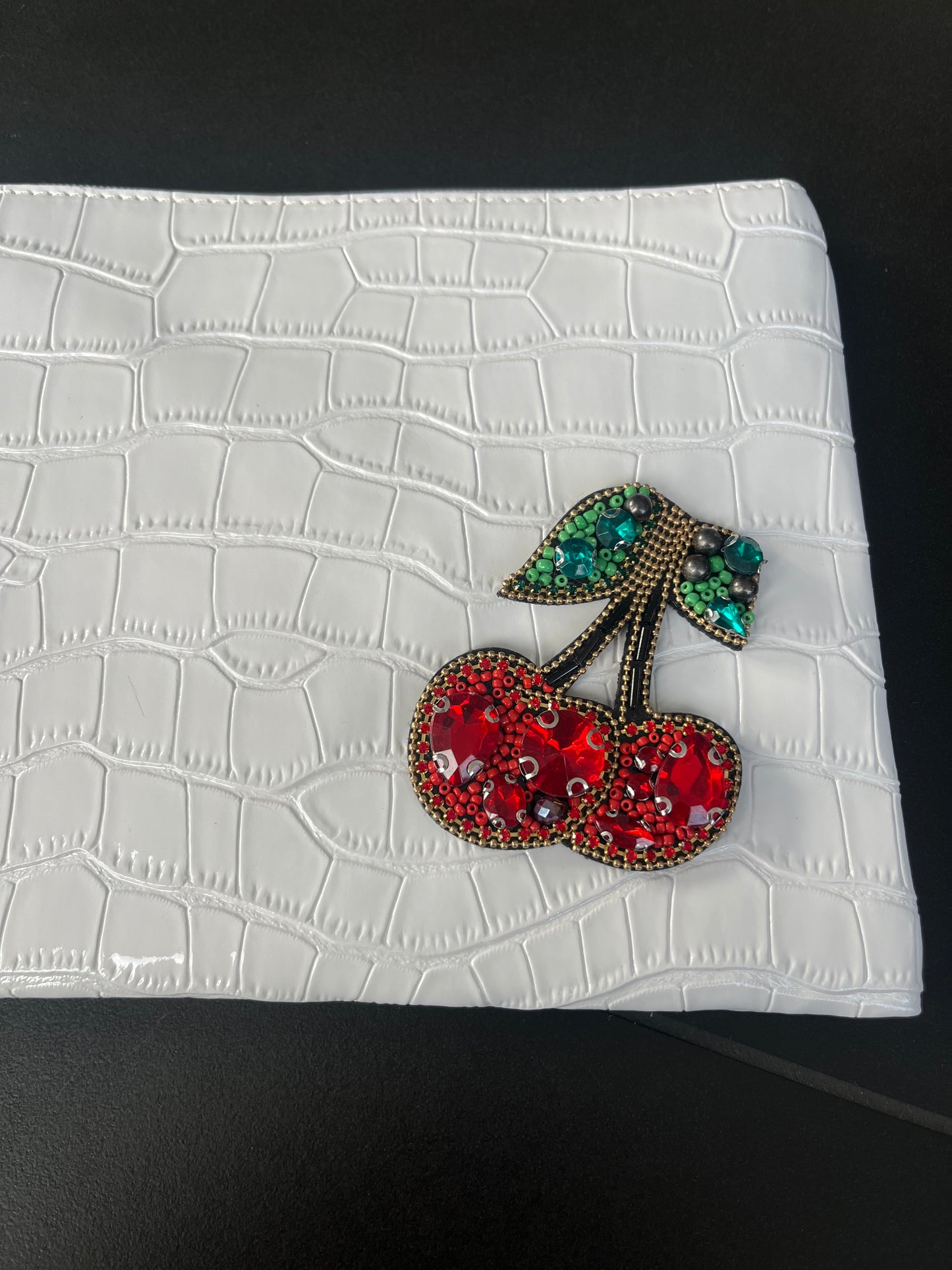 White Gem cherry clutch bag