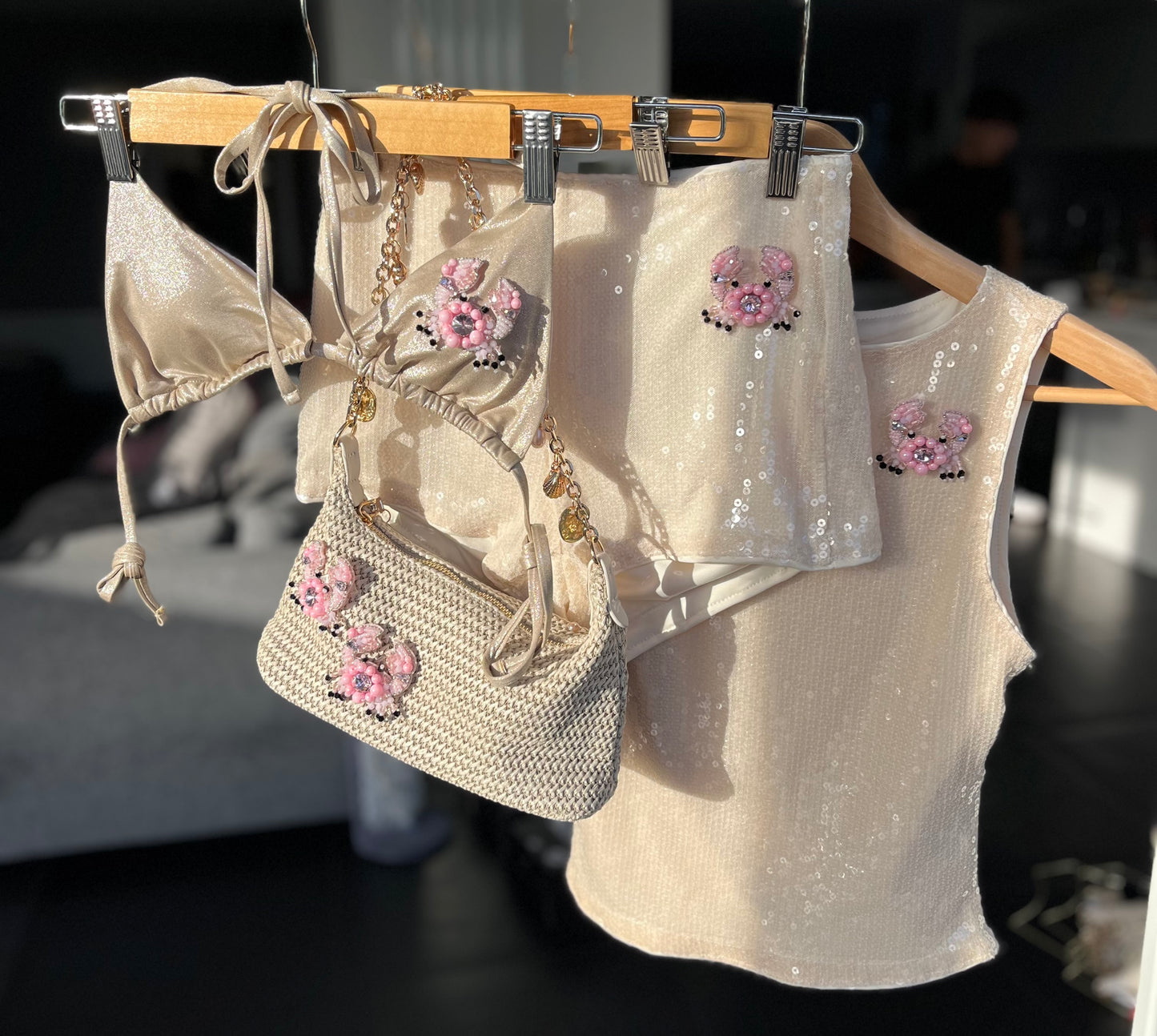 Beige beaded crabs charm bag