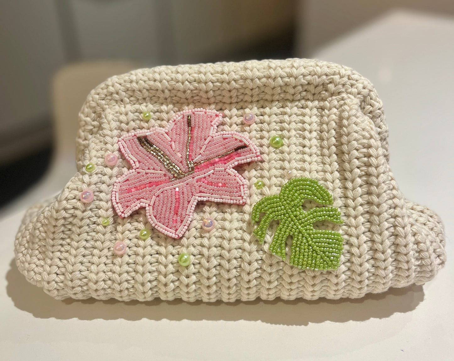 Crème beaded flora & leaf clutch bag