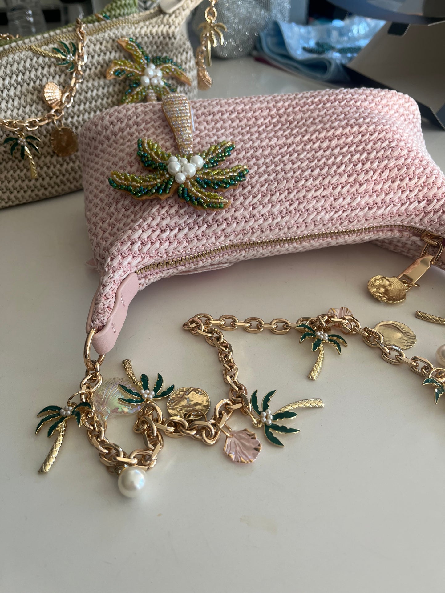 Pink beaded palm tree charm bag