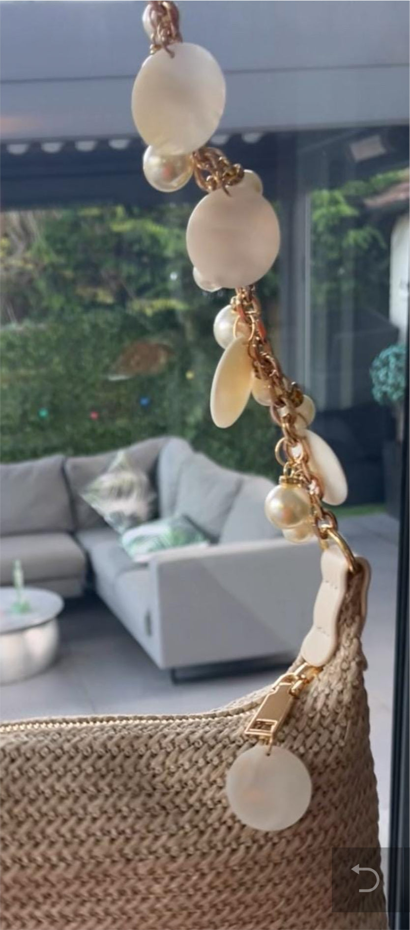 Beige pearls & shells charm bag