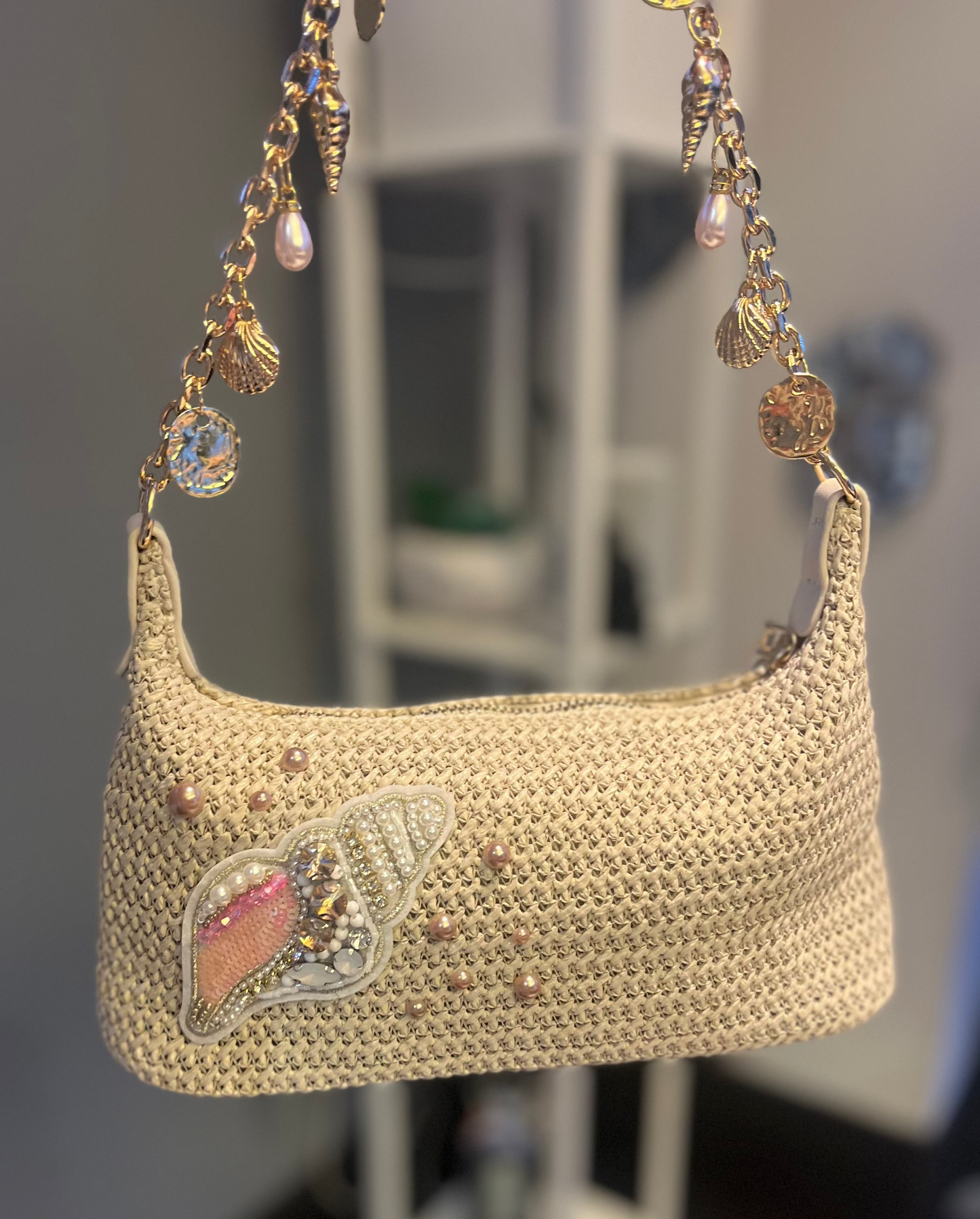 Beige beaded shell charm bag