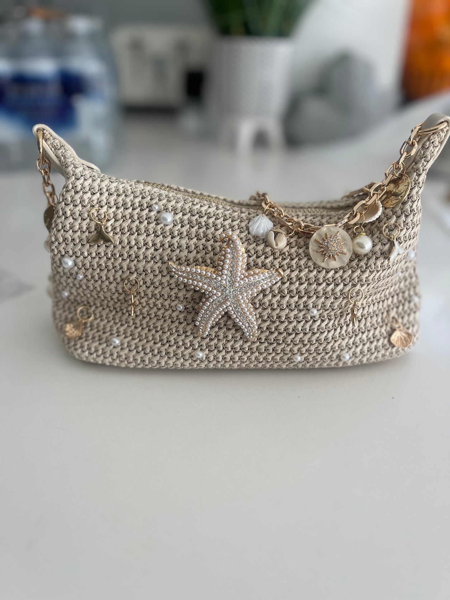 Beige pearled starfish charm bag