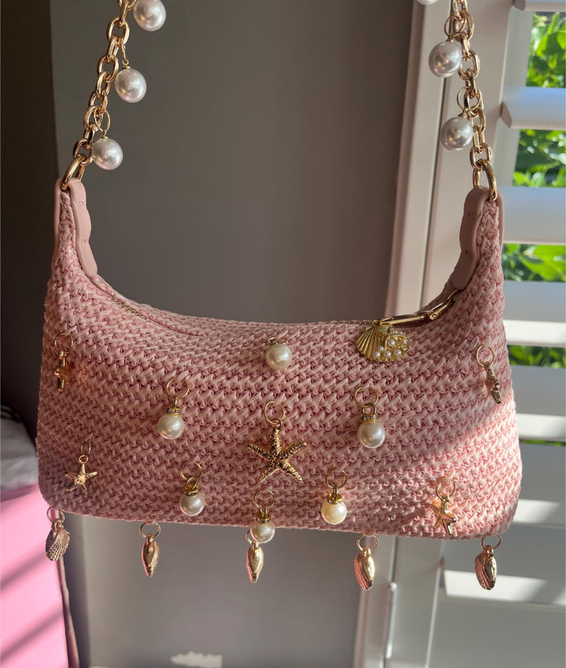 Pink multi charm bag
