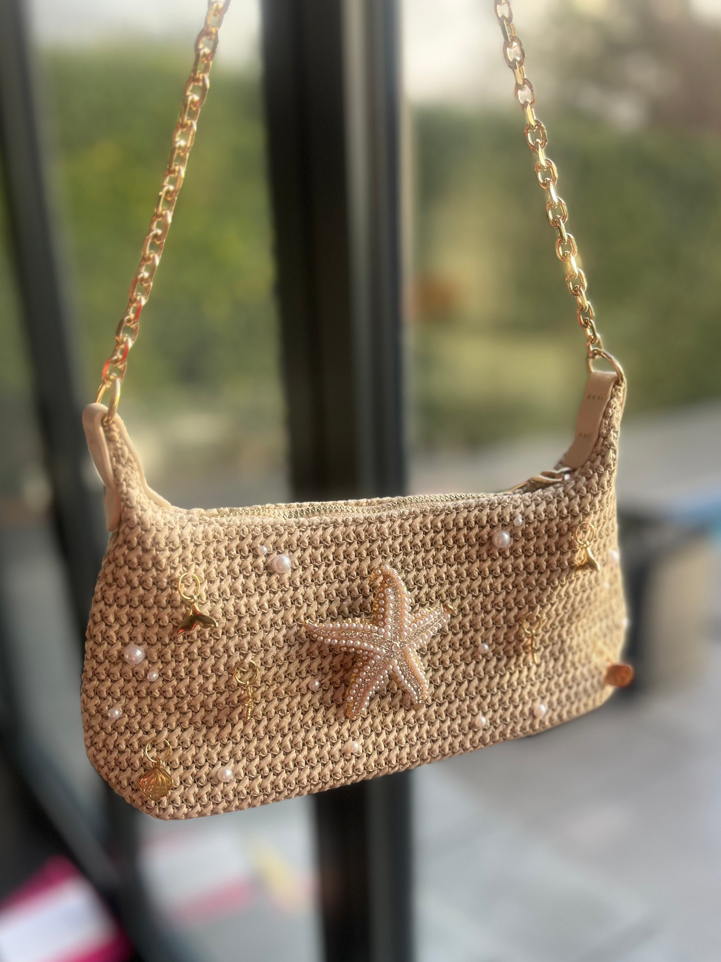 Beige pearled starfish charm bag