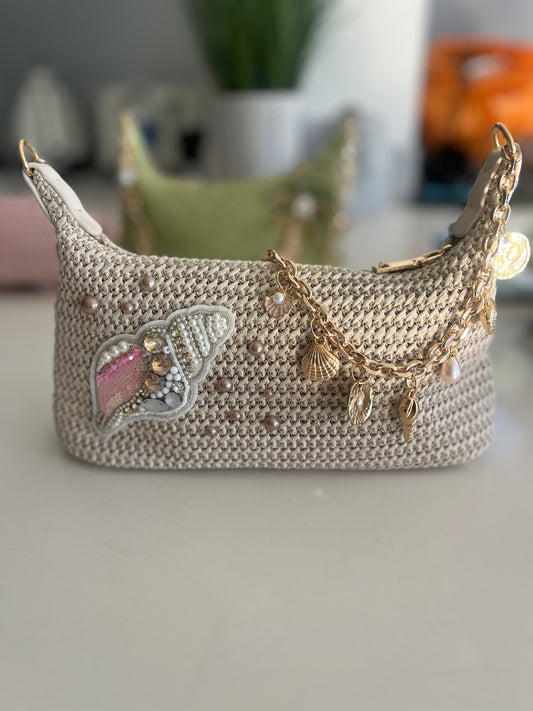 Beige beaded shell charm bag