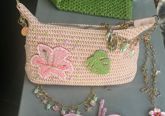 Pink beaded flora & leaf charm bag