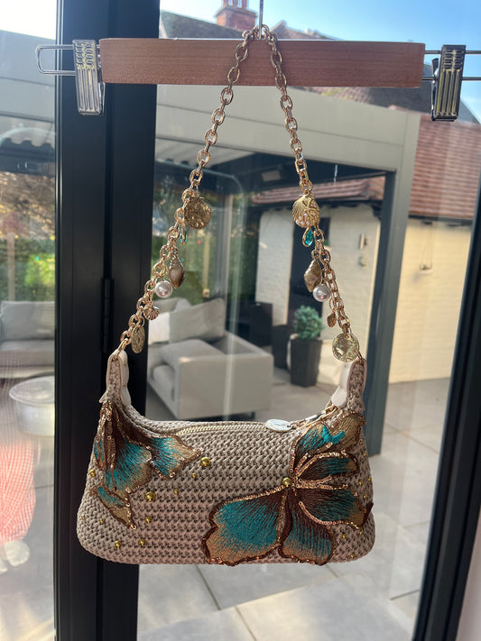 Beige teal blossom charm bag