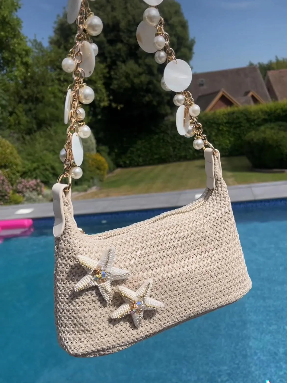 Beige double cream starfish pearls & shells charm bag