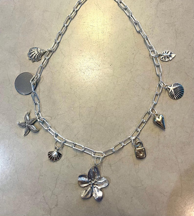 Silver flower charm necklace