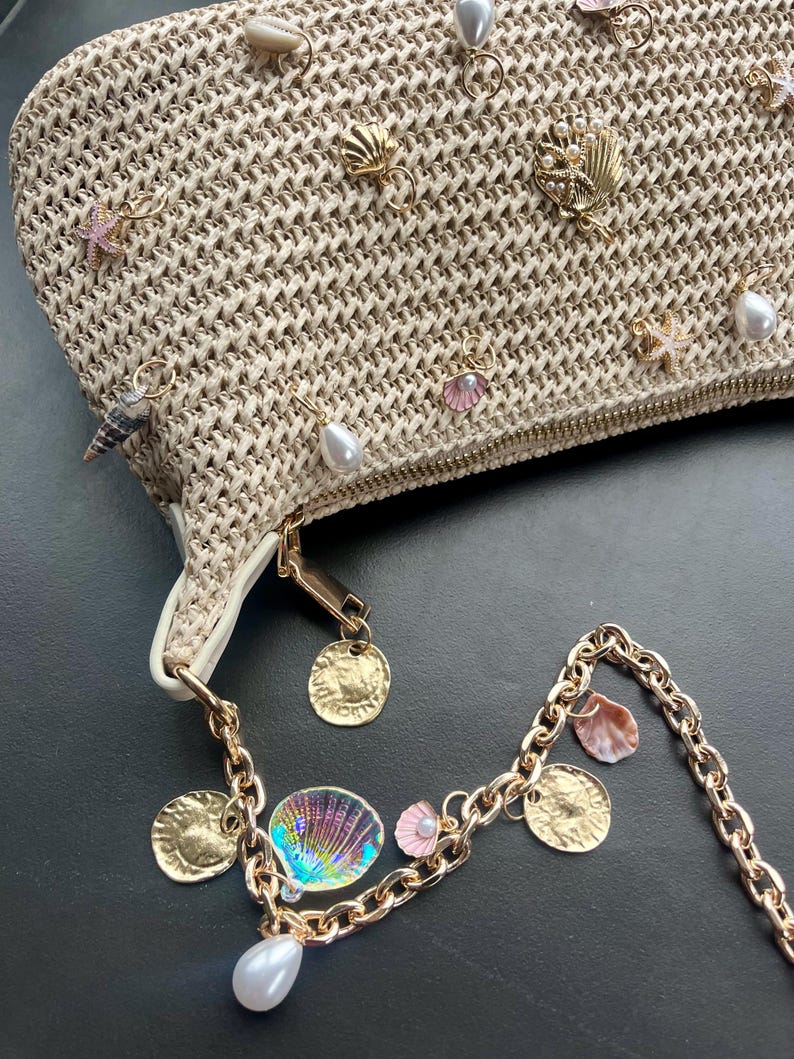 Beige multi charm bag