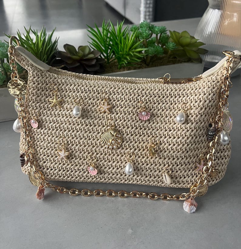 Beige multi charm bag