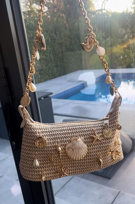 Beige centre shell charm bag