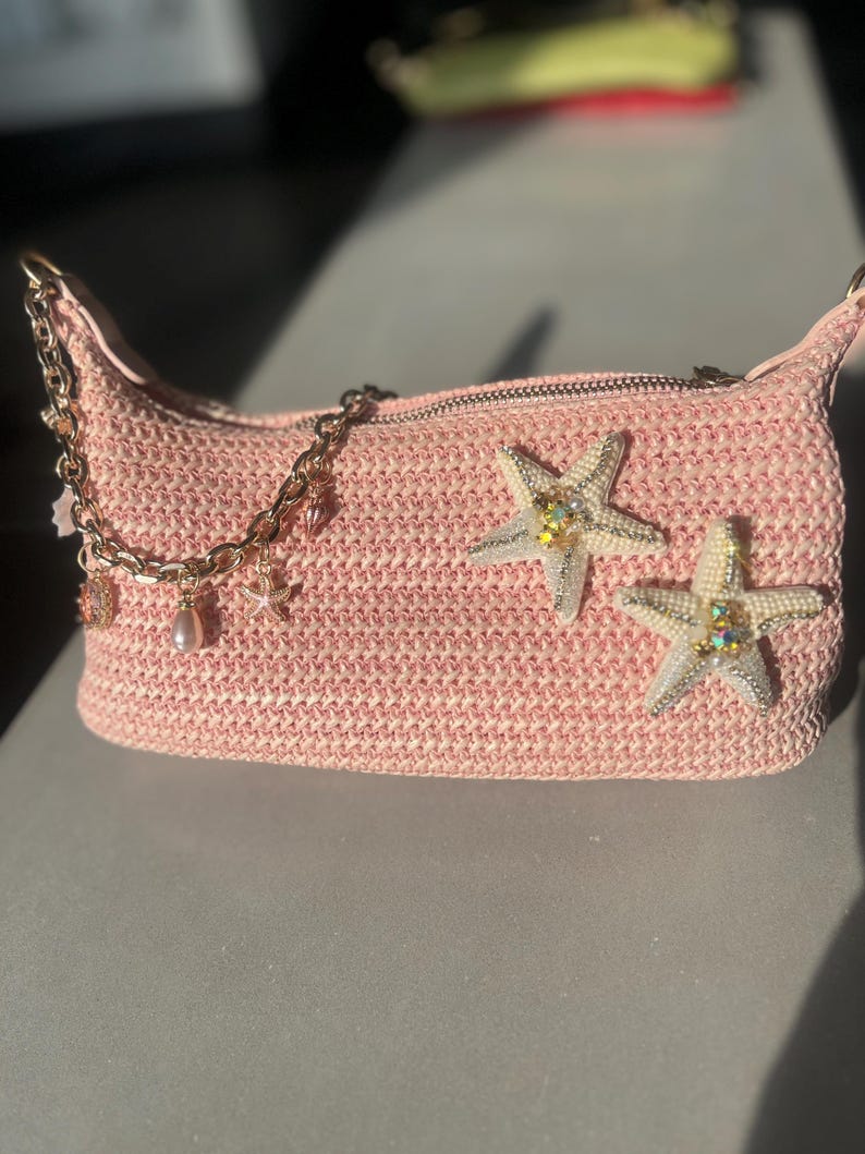 Pink double cream starfish charm bag