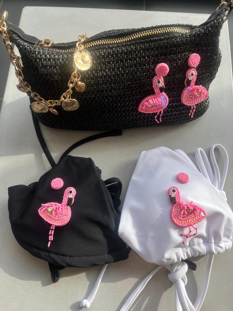 Black flamingo charm bag